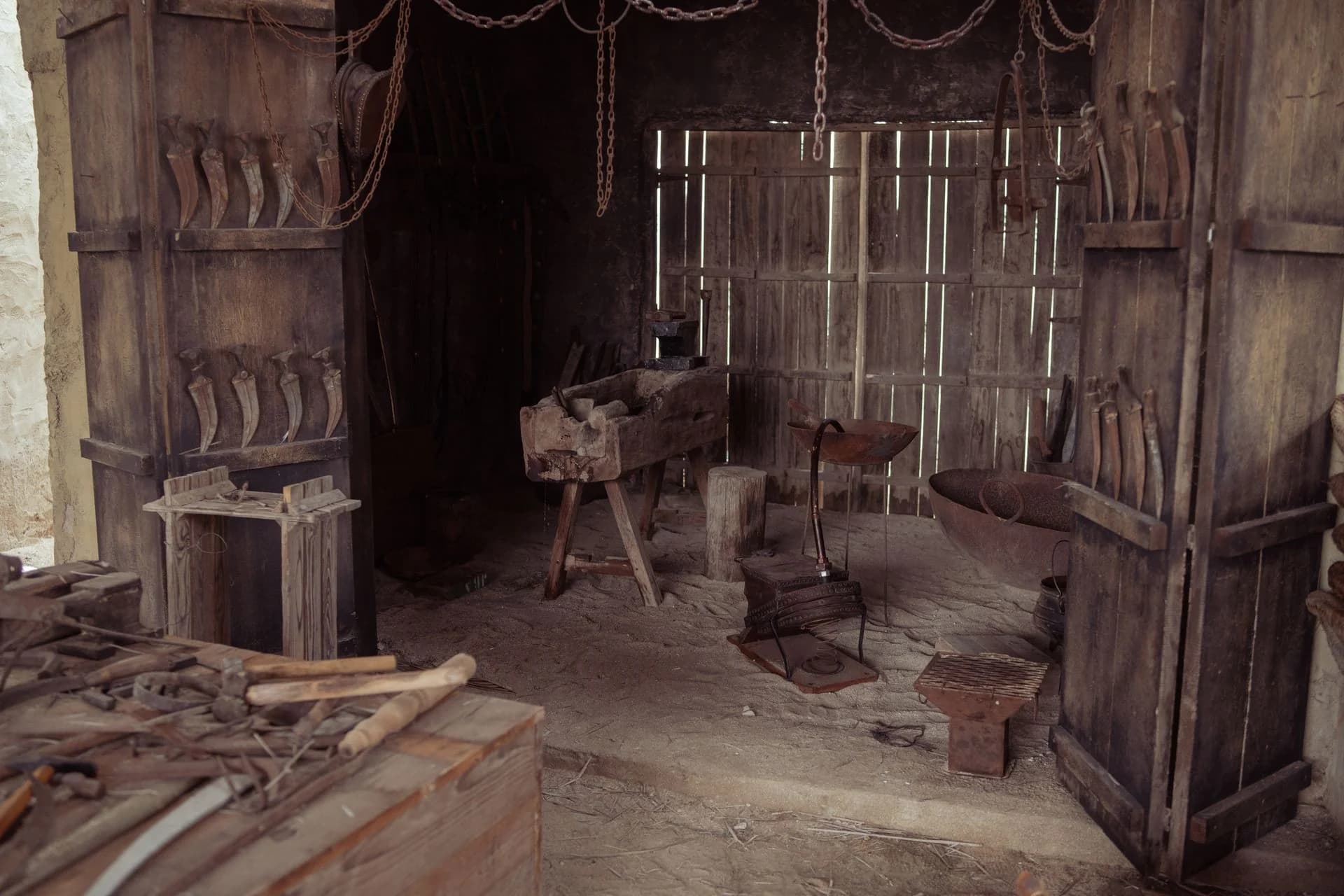 Rustic blacksmith workshop with tools and an anvil